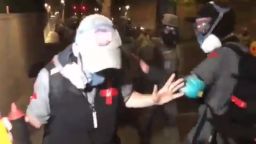 A viral video showing volunteer medics being shoved to the ground by law enforcement officers in Portland is raising new questions about the tactics being used by authorities to handle ongoing protests in the city. The ACLU has filed a lawsuit on behalf of several protestors, including two volunteer medics who say they were involved in a physical encounter with authorities as the medics attempted to treat an injured person.
