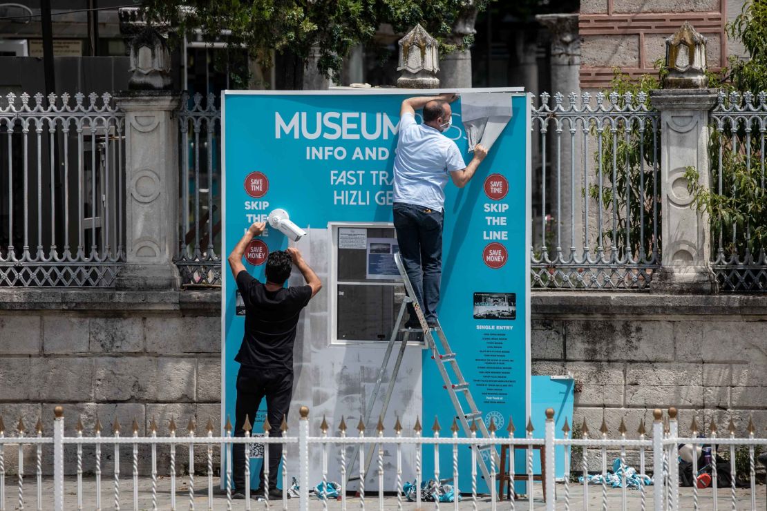 Workmen dismantle the Hagia Sophia Museum ticket booth on July 17, 2020 in Istanbul.