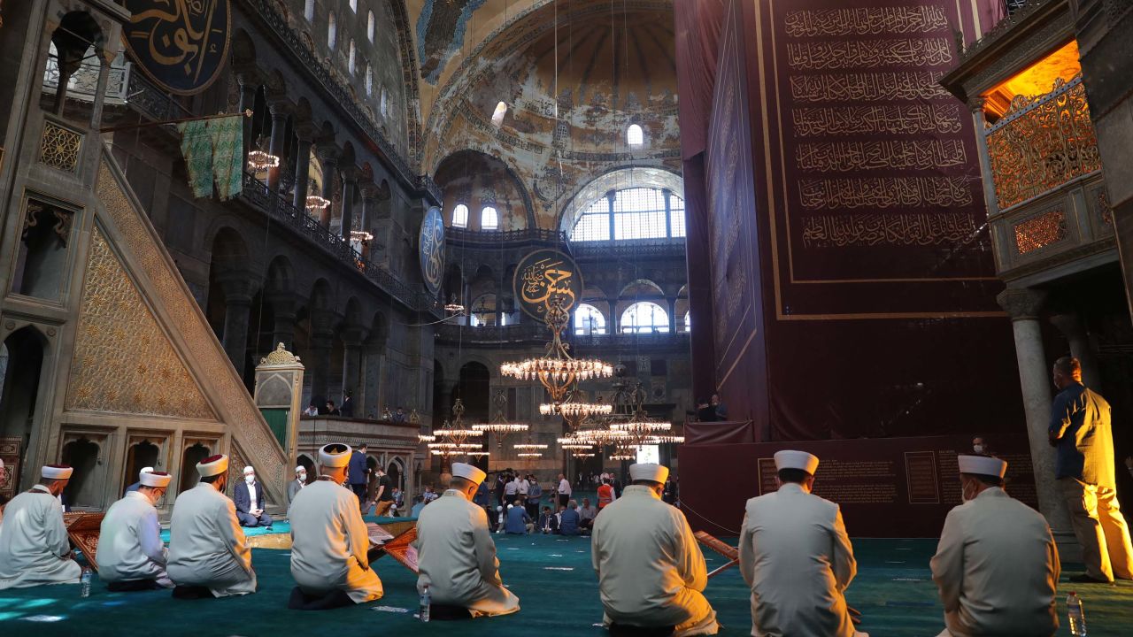 Worshipers join a prayer program at Hagia Sophia ahead of the first Friday prayers there in 86 years.