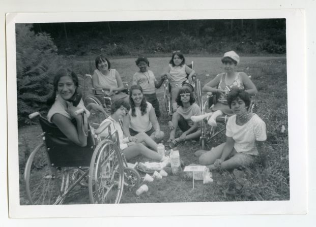 "It was a utopia — when we were there, there was no outside world," says camper Denise Sherer Jacobson, smiling at the camera on the far left. Jacobson became a writer and disability educator.