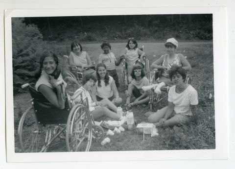 "It was a utopia — when we were there, there was no outside world," says camper Denise Sherer Jacobson, smiling at the camera on the far left. Jacobson became a writer and disability educator.