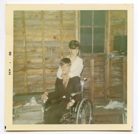 Camper Terri Feinstein has her arms around counselor Steve Hofmann in his wheelchair. Many of the counselors from "Crip Camp" became part of the disability rights movement.