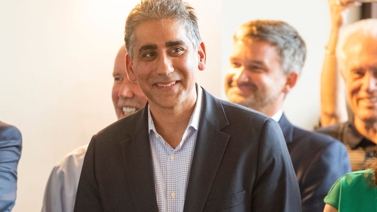 Manny Sethi, center, laughs as Texas Sen. Ted Cruz, not pictured, speaks at a campaign event held at Southern Railway Station in Knoxville, Tennessee, on Friday.
(Photo by Brianna Paciorka/News Sentinel /USA Today Network/Sipa USA)