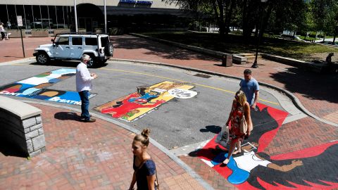 Teams of artists worked together to paint "Black Lives Matter" in the street around Pack Square in downtown Asheville.