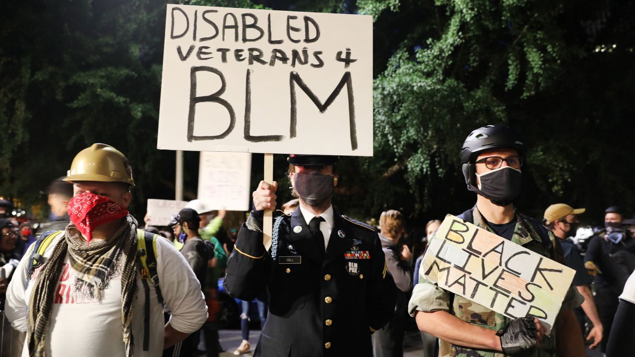 A group of veterans join the protest.