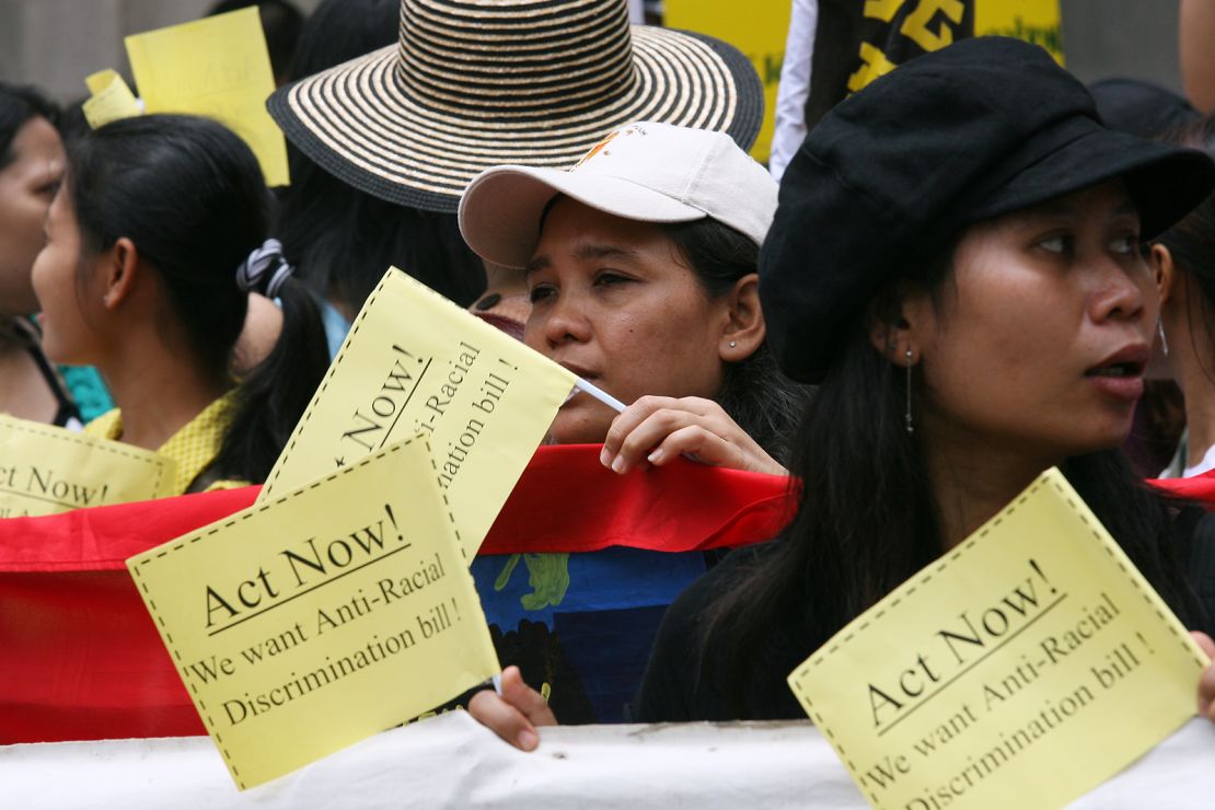 Ethnic minorities protest against racial discrimination in Hong Kong in July 2006, as the government drafts the Race Discrimination Ordinance. 