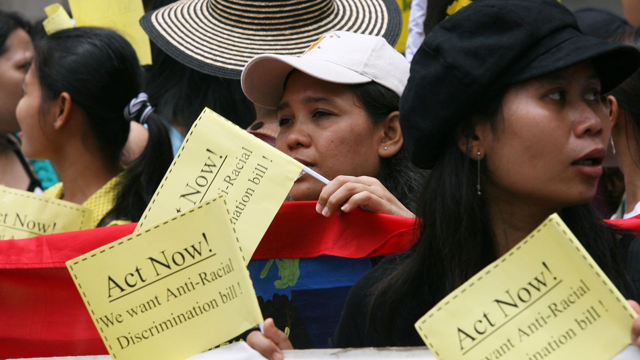 Ethnic minorities protest against racial discrimination in Hong Kong in July 2006, as the government drafts the Race Discrimination Ordinance.