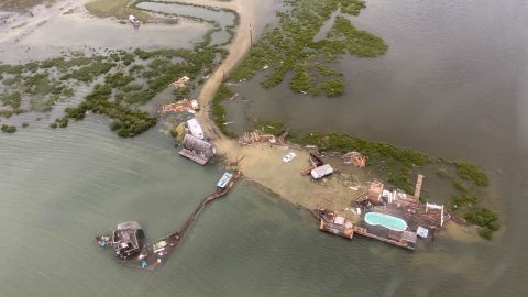 A Coast Guard Sector/Air Station Corpus Christi MH-65 Dolphin aircrew investigates areas impacted by Hurricane Hanna near Aransas Pass, Texas, on Sunday.