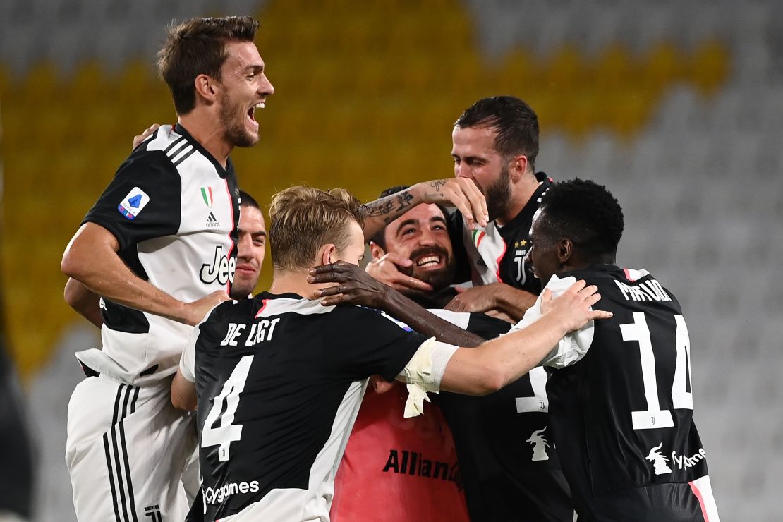 Juventus players celebrate winning the Serie A title.