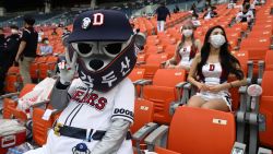 SEOUL, SOUTH KOREA - JULY 26: Fans enjoy during the KBO League game between LG Twins and Doosan Bears at the Jamsil Stadium on July 26, 2020 in Seoul, South Korea. South Korean baseball start accepting fans to stadiums, ahead of other sports after new coronavirus pandemic, up to 10 percent of its capacity. (Photo by Chung Sung-Jun/Getty Images)