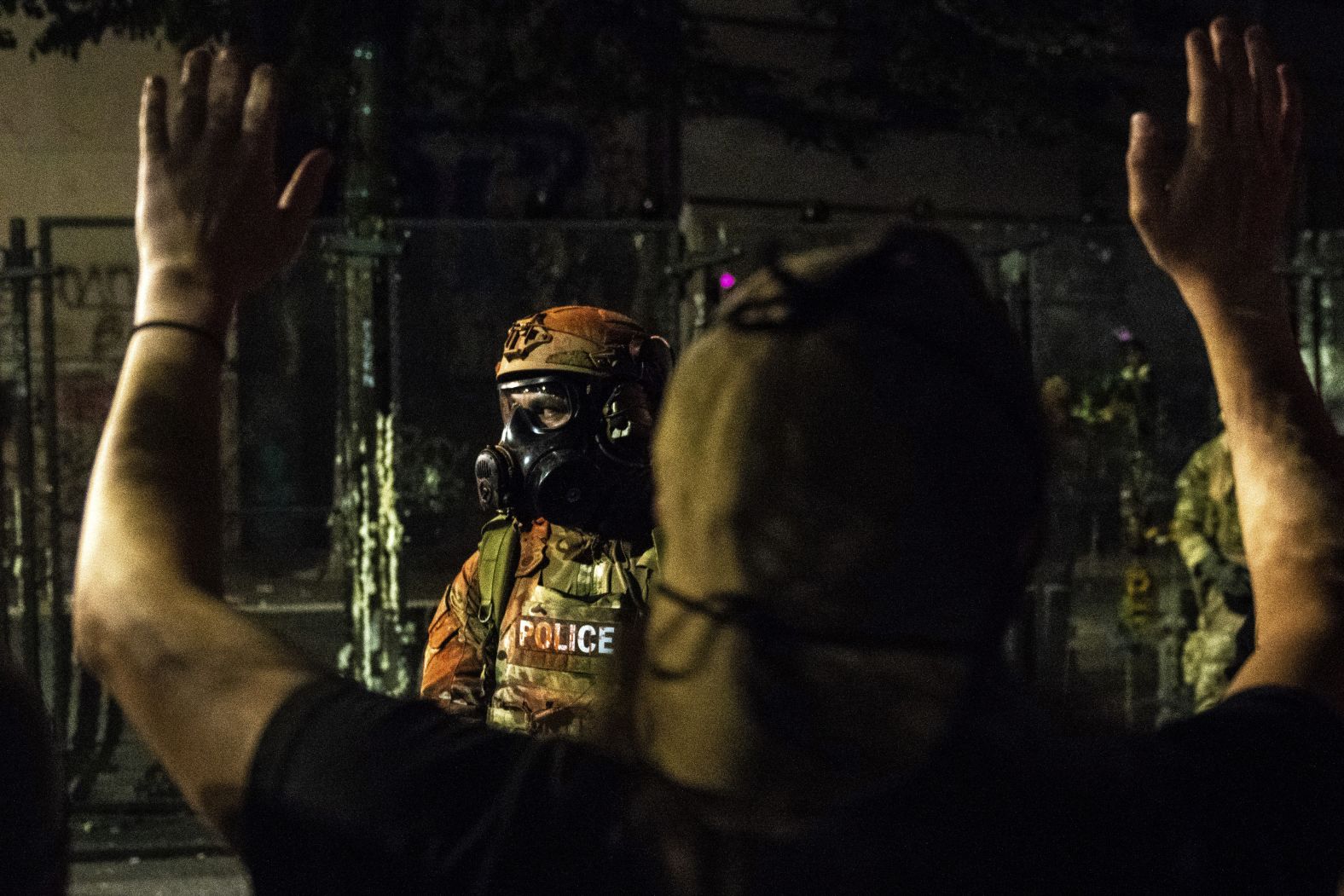 A person protests outside the Mark O. Hatfield US Courthouse on July 25.