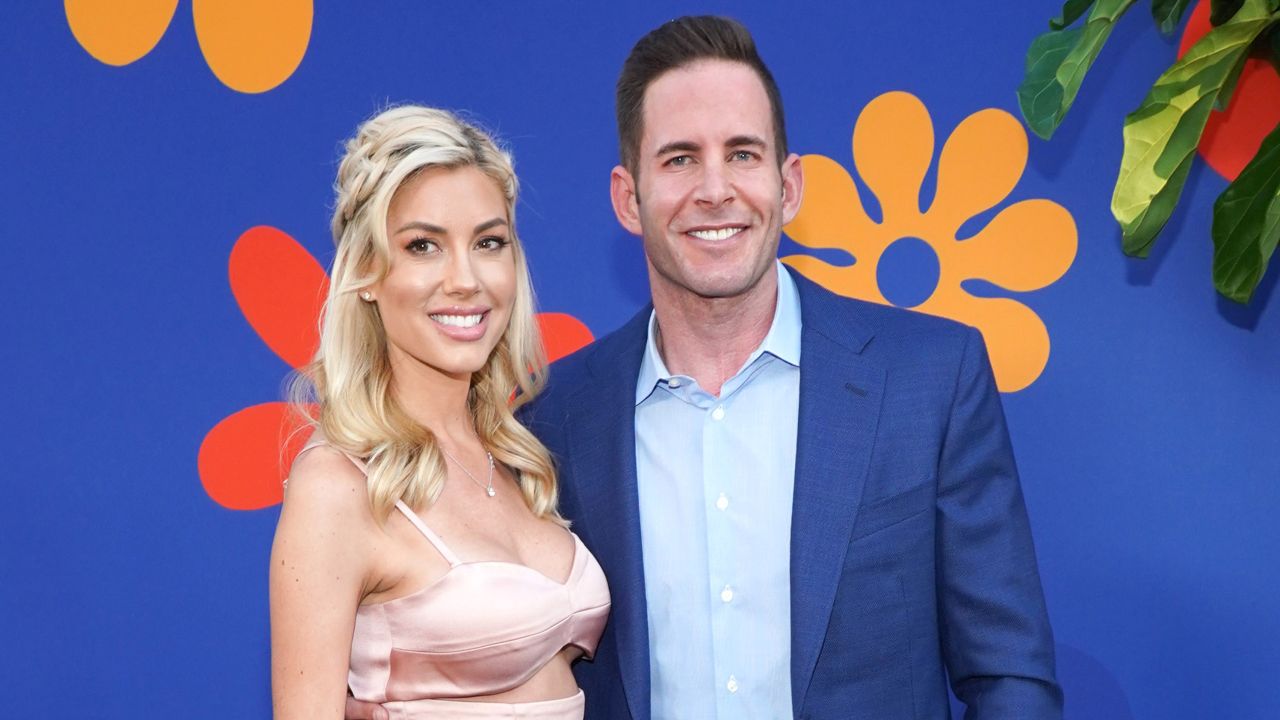Tarek El Moussa and Heather Rae Young attend the premiere of HGTV's "A Very Brady Renovation" in September 2019.