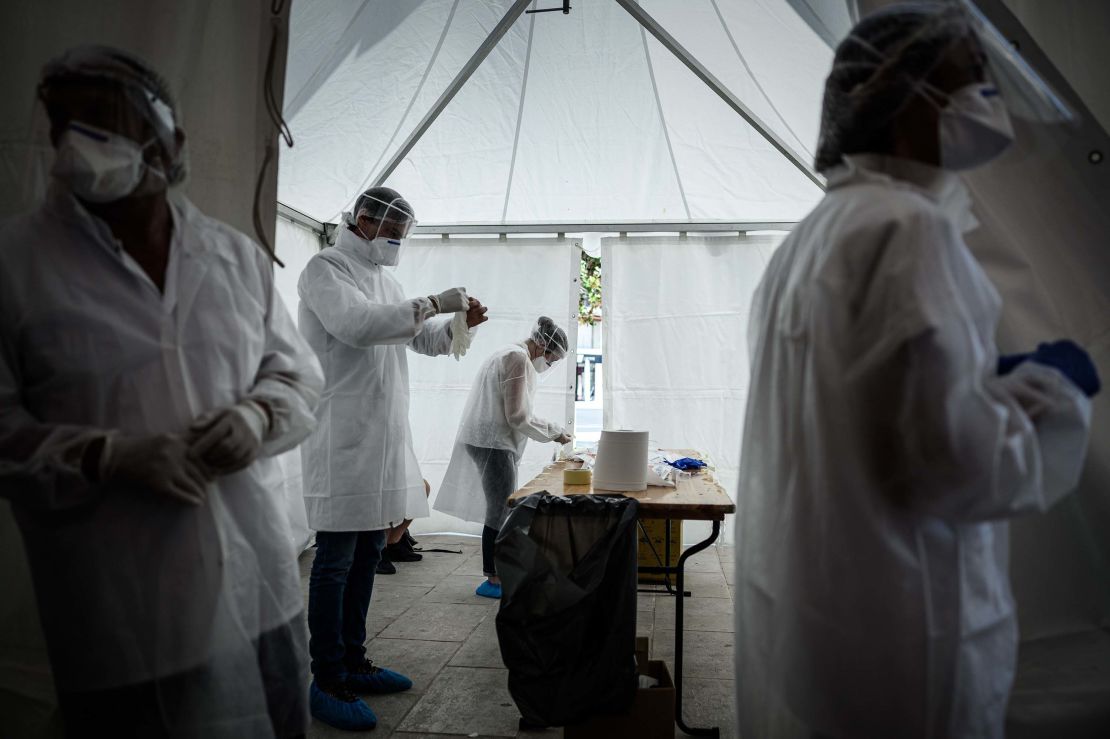 Medical staff at a coronavirus screening operation outside Arcachon railway station in southwestern France. The popular destination faces concerns over rising numbers of cases there.