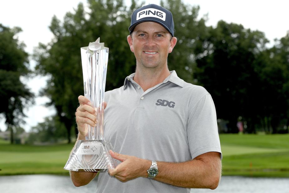 The seven-year-wait: Michael Thompson poses with the trophy after winning the 3M Open on July 26, 2020 at TPC Twin Cities in Blaine, Minnesota. The win was the 35-year-old's second PGA Tour event victory, 2,702 days after his first. 