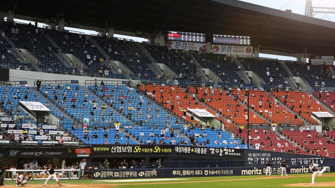Baseball fans watch on from the stands during the KBO League game between LG Twins and Doosan Bears.