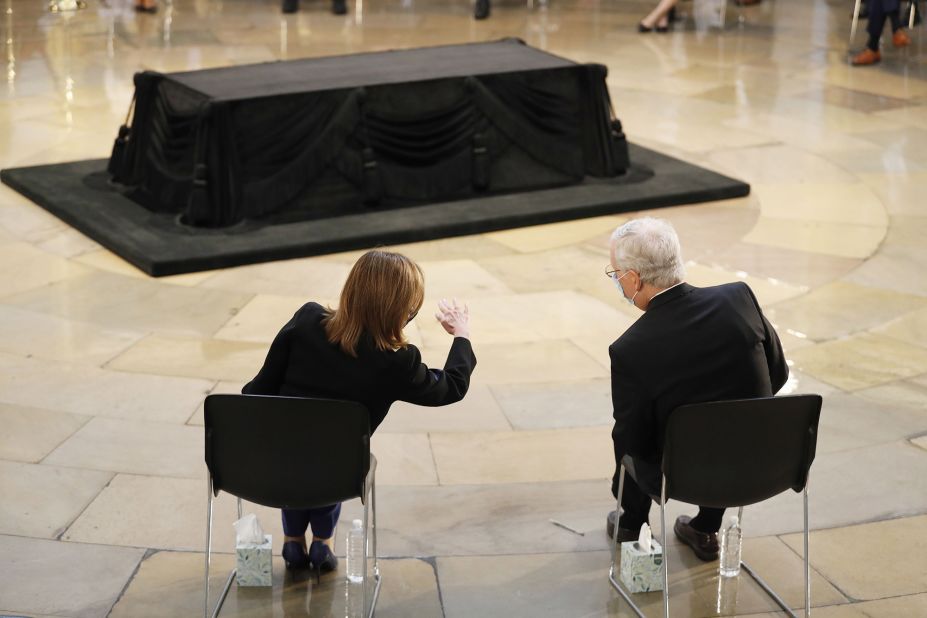 House Speaker Nancy Pelosi and Senate Majority Leader Mitch McConnell speak at a ceremony Monday before Lewis' casket arrived at the Capitol.