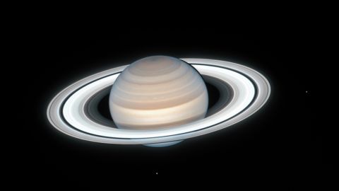 NASA's Hubble Space Telescope captured this image of Saturn on July 4, 2020. Two of Saturn's icy moons are clearly visible in this exposure.