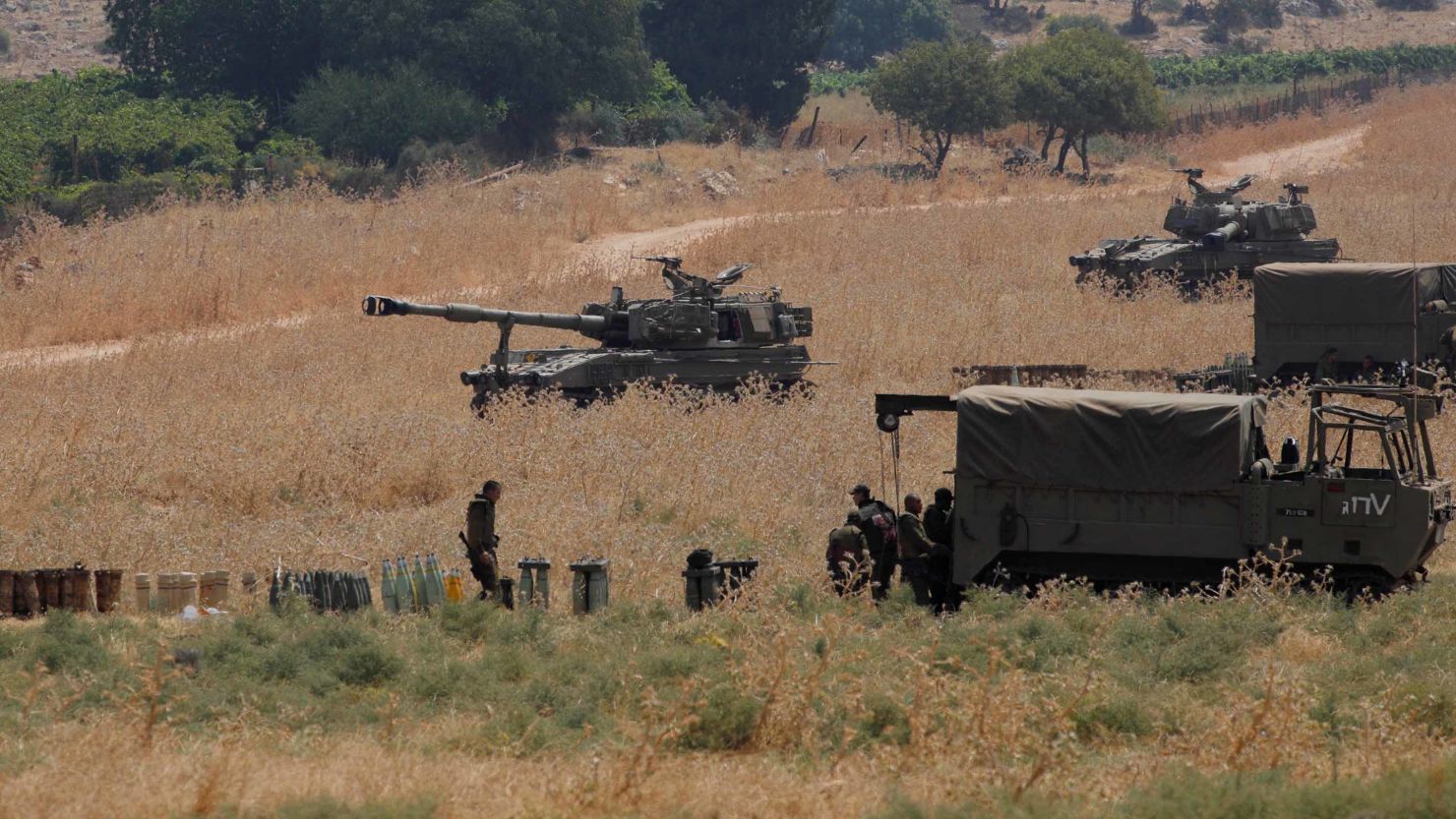 Armoured vehicles and 155 mm self-propelled howitzers are deployed in the Upper Galilee in northern Israel on the border with Lebanon on July 27, 2020.