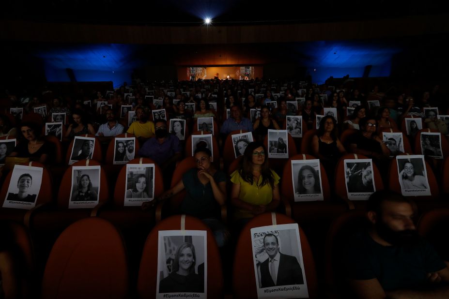 Portraits are taped onto seats to help theatergoers spread out in Nicosia, Cyprus, on July 27.