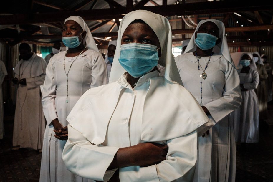 Worshippers of Legio Maria attend a prayer at their church in Nairobi, Kenya, on July 26. Places of worship have reopened in Kenya under strict guidelines.