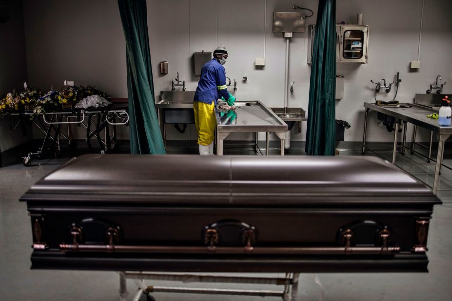 A casket containing the remains of a coronavirus victim waits to be removed from a mortuary in Soweto, South Africa, on July 24.