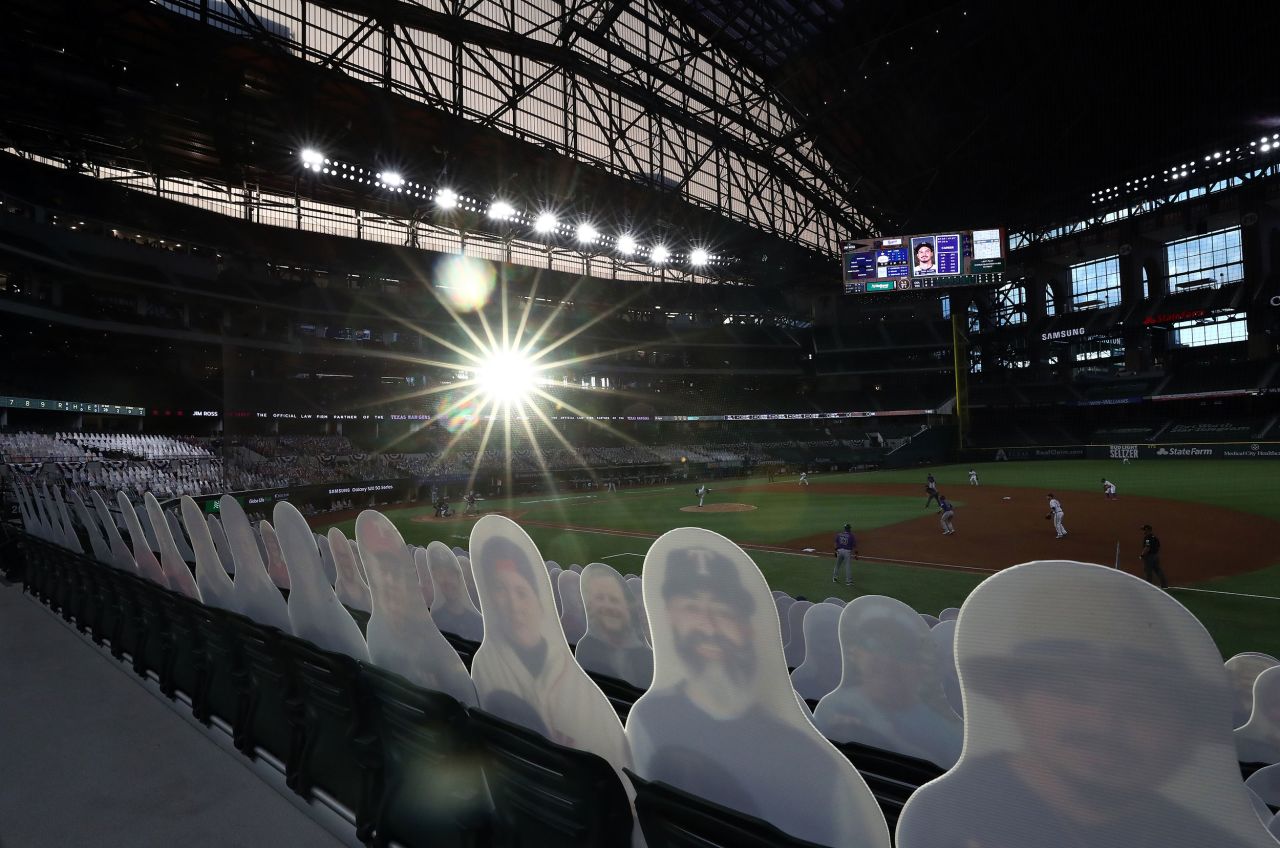 Cardboard cutouts of fans are seen in Globe Life Field during a Major League Baseball game in Arlington, Texas, on July 24. <a href="index.php?page=&url=http%3A%2F%2Fwww.cnn.com%2F2020%2F07%2F22%2Fus%2Fgallery%2Fbaseball-begins-2020%2Findex.html" target="_blank">The league has resumed</a> for a 60-game abbreviated season, but fans are not allowed to attend.