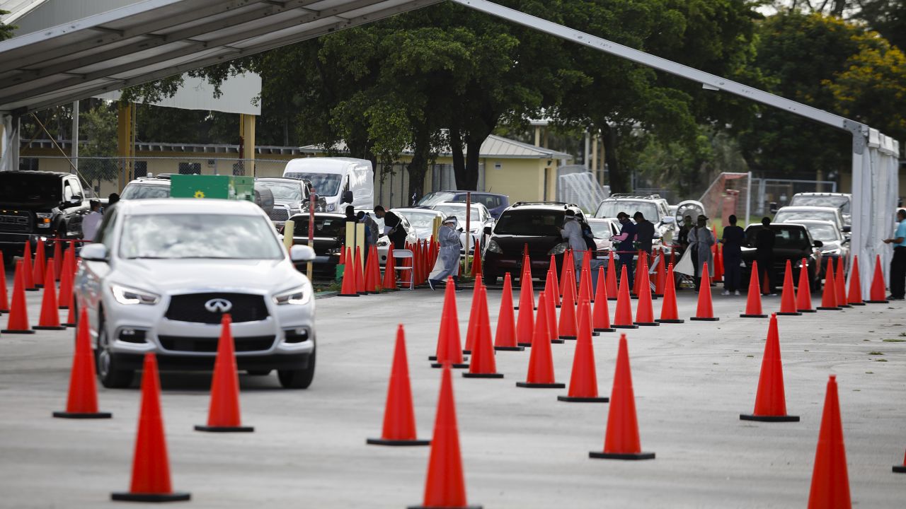 A line forms at a self-swab Covid-19 drive-thru testing site in Miami on Monday.
