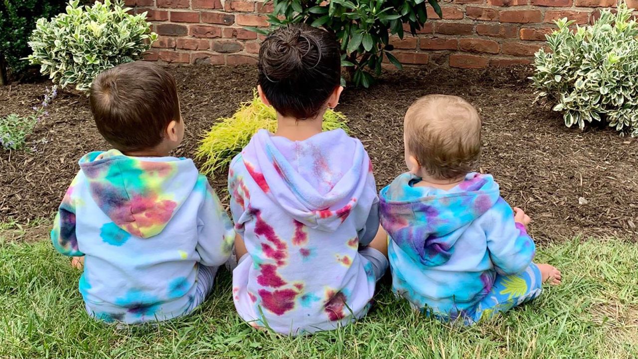 Maya Joyandeh of Teaneck, New Jersey, enlisted her 6-year-old daughter (center) to tie-dye sweatshirts for her younger brothers.