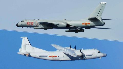 A Chinese H-6 bomber and Y-9 transport aircraft photographed by Japanese fighters on intercept missions.