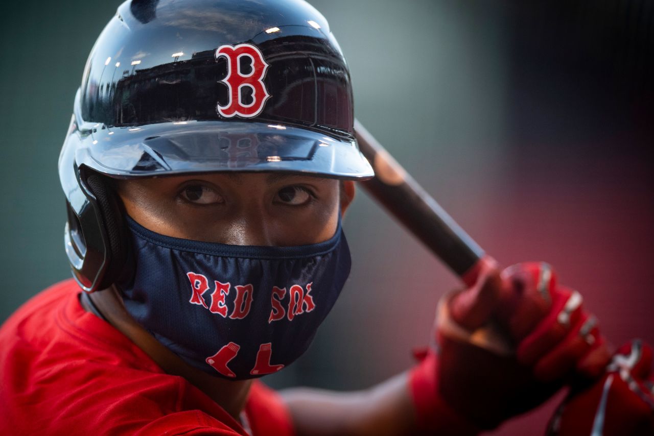 Tzu-Wei Lin wears a mask during a Boston Red Sox intrasquad game on July 17. Major League Baseball <a href="http://www.cnn.com/2020/07/22/us/gallery/baseball-begins-2020/index.html" target="_blank">restarted its season</a> a week later, but without fans in the stands.