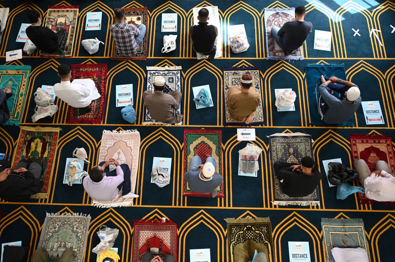 Muslims spread out during Friday prayers at a Sheffield, England, mosque on July 24.