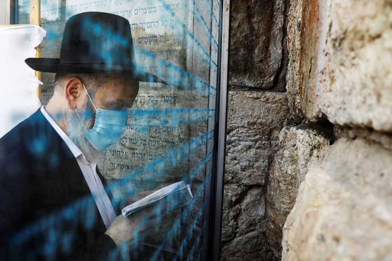 A man prays by the Western Wall in Jerusalem's Old City on July 21.