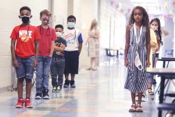 Students social distance on their first day back to school in Corinth, Mississippi.