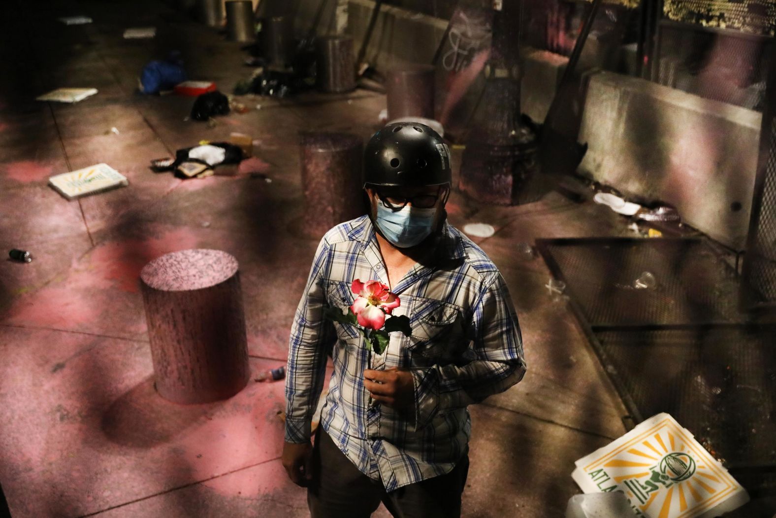 A protester stands in front of the Mark O. Hatfield US Courthouse on July 28.