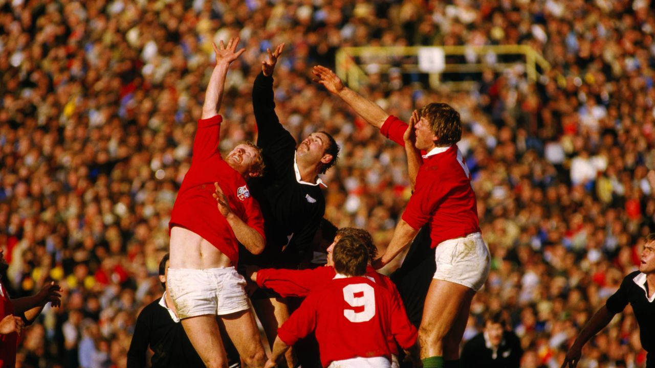 Andy Haden (center) reaches for the ball during a test between New Zealand and the Lions in 1983.    