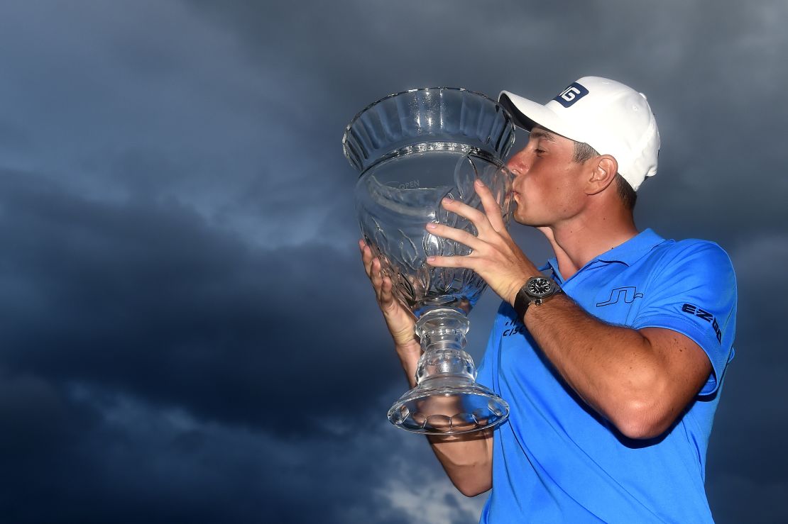 Hovland poses with the trophy after winning the Puerto Rico Open.