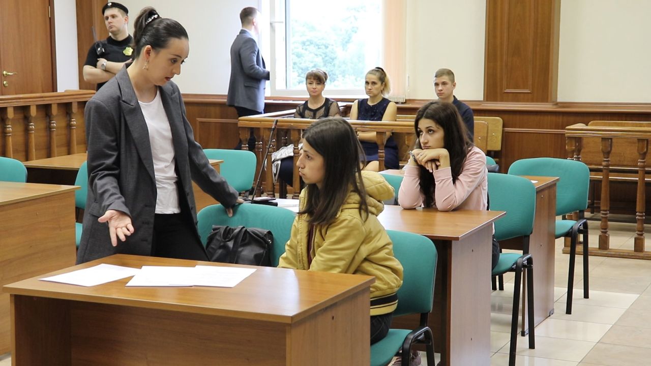 Angelina (center) and Krestina (back), during a hearing at Moscow's Basmanny District Court.