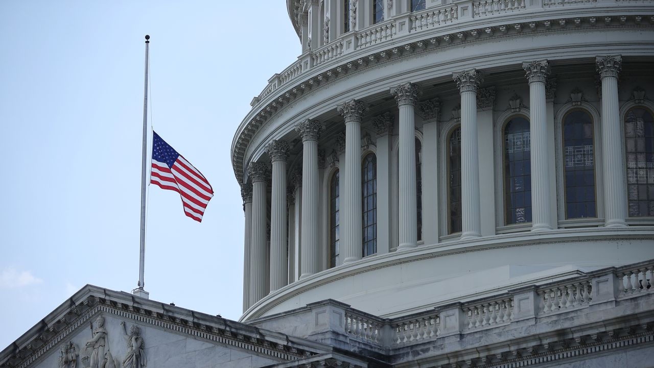 WASHINGTON, DC - JULY 27: The flag flies at half-staff in honor of Rep. John Lewis (D-GA) outside the U.S. Capitol where he will lie in state July 27, 2020 in Washington, DC. Called 'the conscience of the U.S. Congress,' Lewis was a civil rights pioneer, contemporary of Dr. Martin Luther King, Jr. and helped to organize and address the historic March on Washington in August 1963. Lewis served Georgia's fifth congressional district from 1987 until his death on July 17. (Photo by Chip Somodevilla/Getty Images)