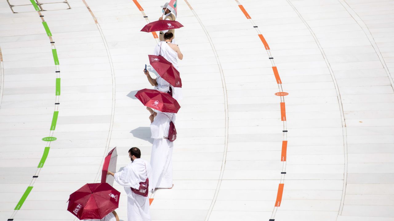 A reduced number of pligrims take part in the Hajj in Mecca.