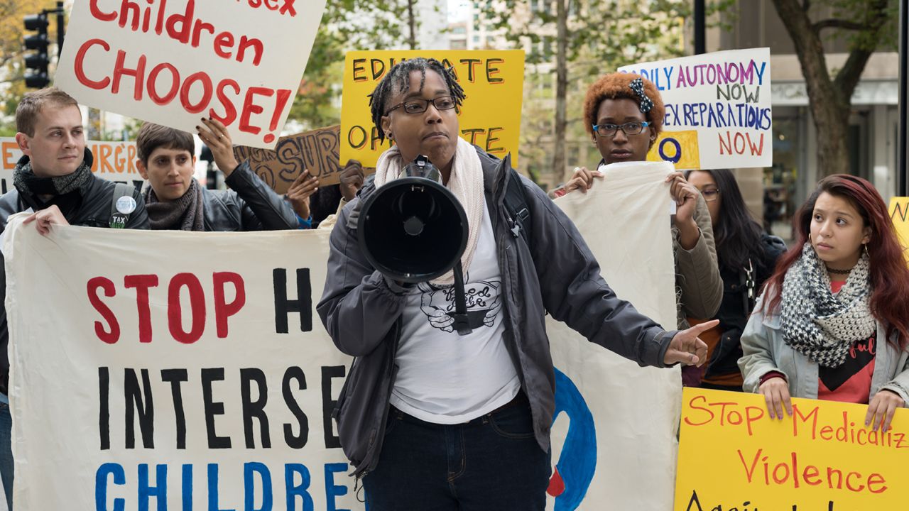 Intersex activist Sean Saifa Wall protests outside Lurie Children's Hospital in 2017.