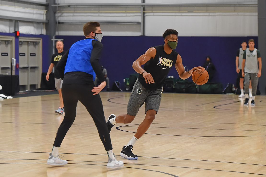 Giannis Antetokounmpo #34 of the Milwaukee Bucks dribbles the ball during practice as part of the NBA restart 2020 on July 27, 2020 in Orlando, Florida.