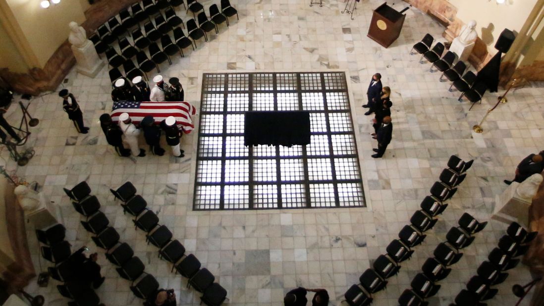Lewis' casket is carried into the Georgia State Capitol in Atlanta on Wednesday.