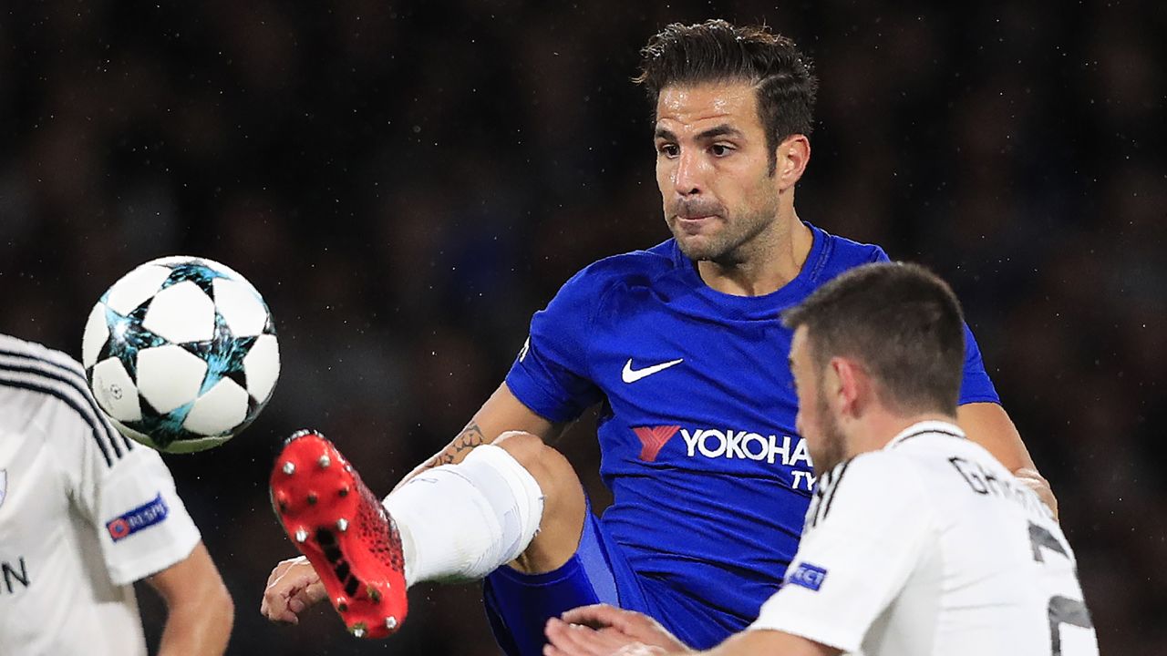 Fabregas (L) vies with Qarabag's Azerbaijani midfielder Gara Garayev during the UEFA Champions League Group C football match between Chelsea and Qarabag at Stamford Bridge in London on September 12, 2017.