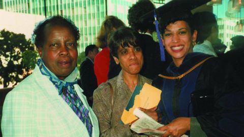 Harris graduates from law school in 1989. "My first grade teacher, Mrs. Wilson (left), came to cheer me on," Harris said. "My mom was pretty proud, too."