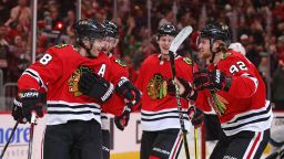 CHICAGO, ILLINOIS - MARCH 11: Patrick Kane #88 of the Chicago Blackhawks (L) celebrates his second goal of the game with (L-R) Slater Koekkoek #68, Olli Maatta #6 and Alex Nylander #92 at the United Center on March 11, 2020 in Chicago, Illinois. The Blackhawks defeated the Sharks 6-2. (Photo by Jonathan Daniel/Getty Images)