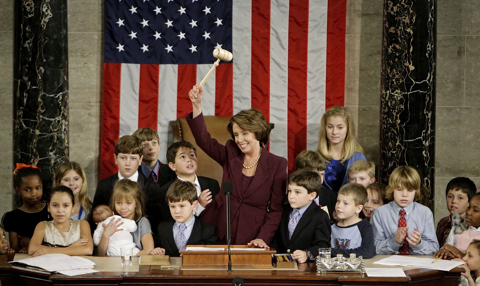 Nancy Pelosi is surrounded by her grandchildren and the children of other Congress members after being elected as the first female Speaker of the House in 2007. She made history again in 2019 when she returned to serve as House Speaker for a third term. 