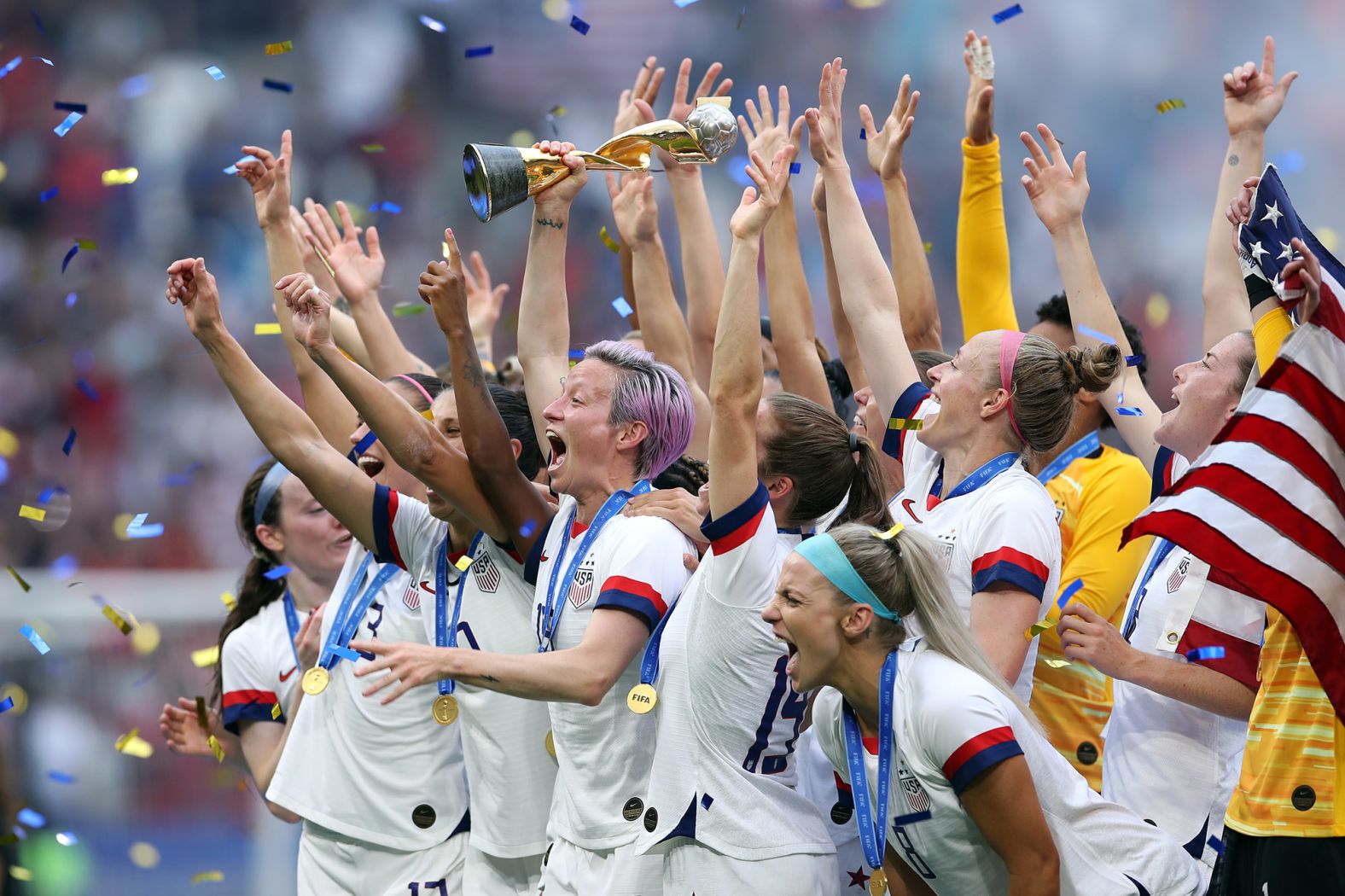 Megan Rapinoe lifts the Women's World Cup trophy after the United States women's soccer team defeated the Netherlands in the 2019 final. Off the field, 28 members of the team sued the US Soccer Federation for paying women players less than they paid men. In May 2020, a federal judge ruled that the team members did not prove wage discrimination. A spokeswoman for the players said they would appeal the decision. 