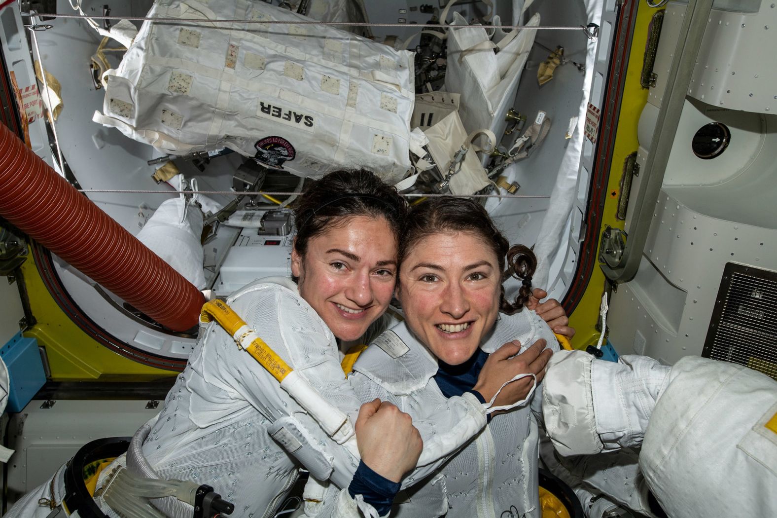 Astronauts Jessica Meir and Christina Koch pose inside the International Space Station. The two conducted the first all-female spacewalk outside of the station in October 2019. "What we're doing now shows all the work that went in for the decades prior, all of the women that worked to get us where we are today," Meir said during a news conference.
