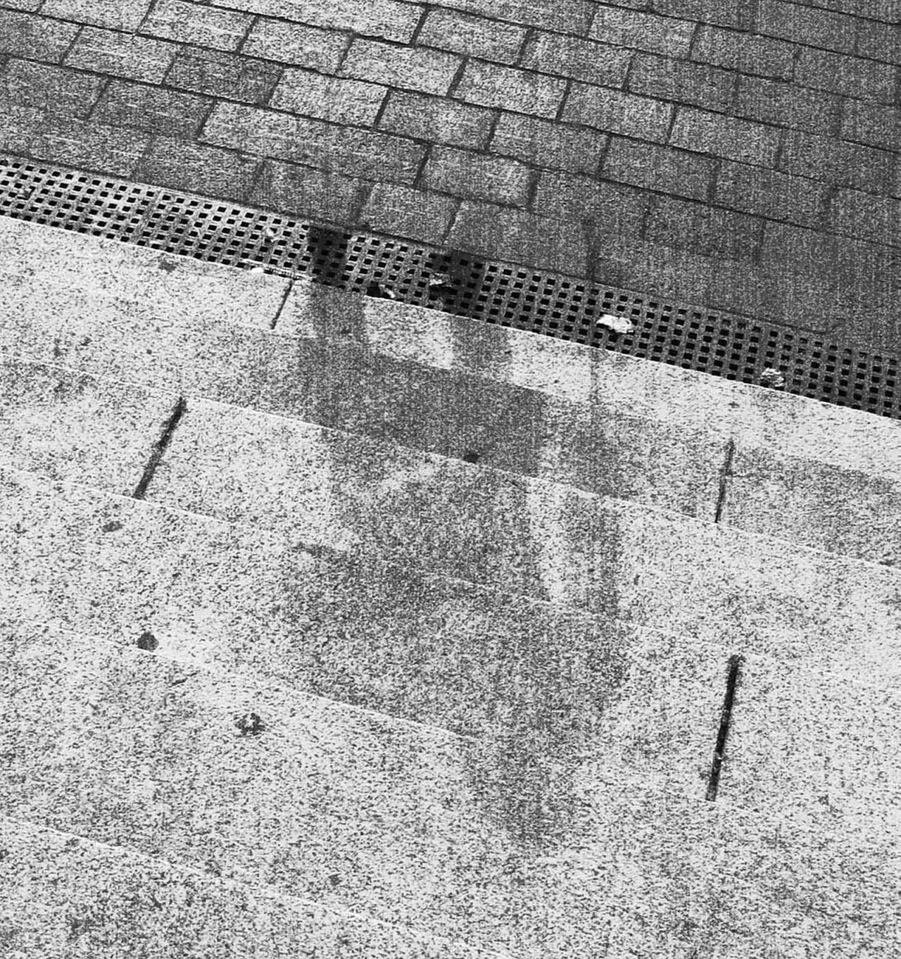 A person's outline is seen on bank steps after the bombing in Hiroshima.