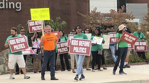 Protesters outside a Howard County government building in Ellicott City, Maryland, on September 26, 2019. The group opposed a school redistricting plan that would force some lower-income students to be relocated to more affluent schools. 